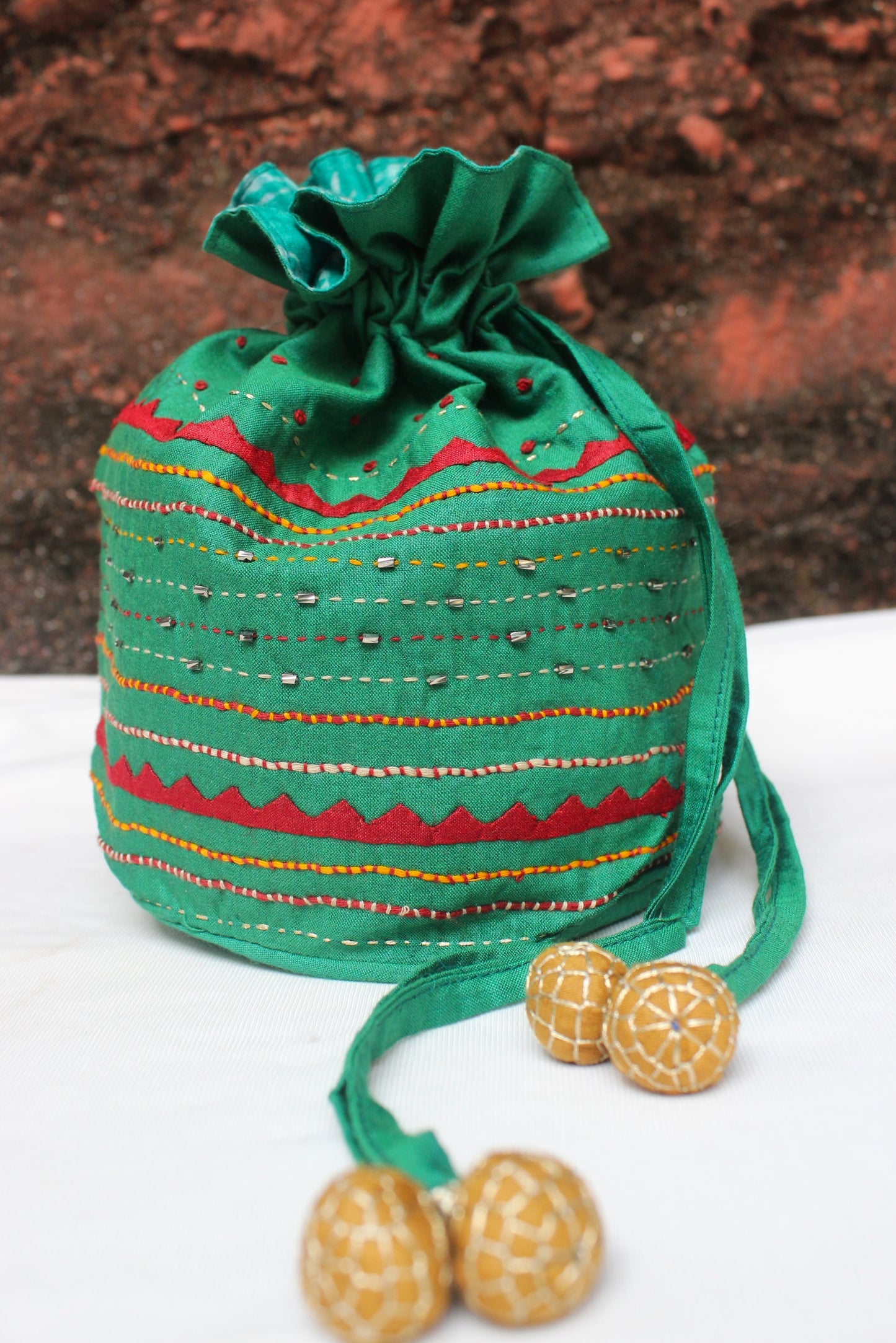 Silk Potli bag with heavy embroidery