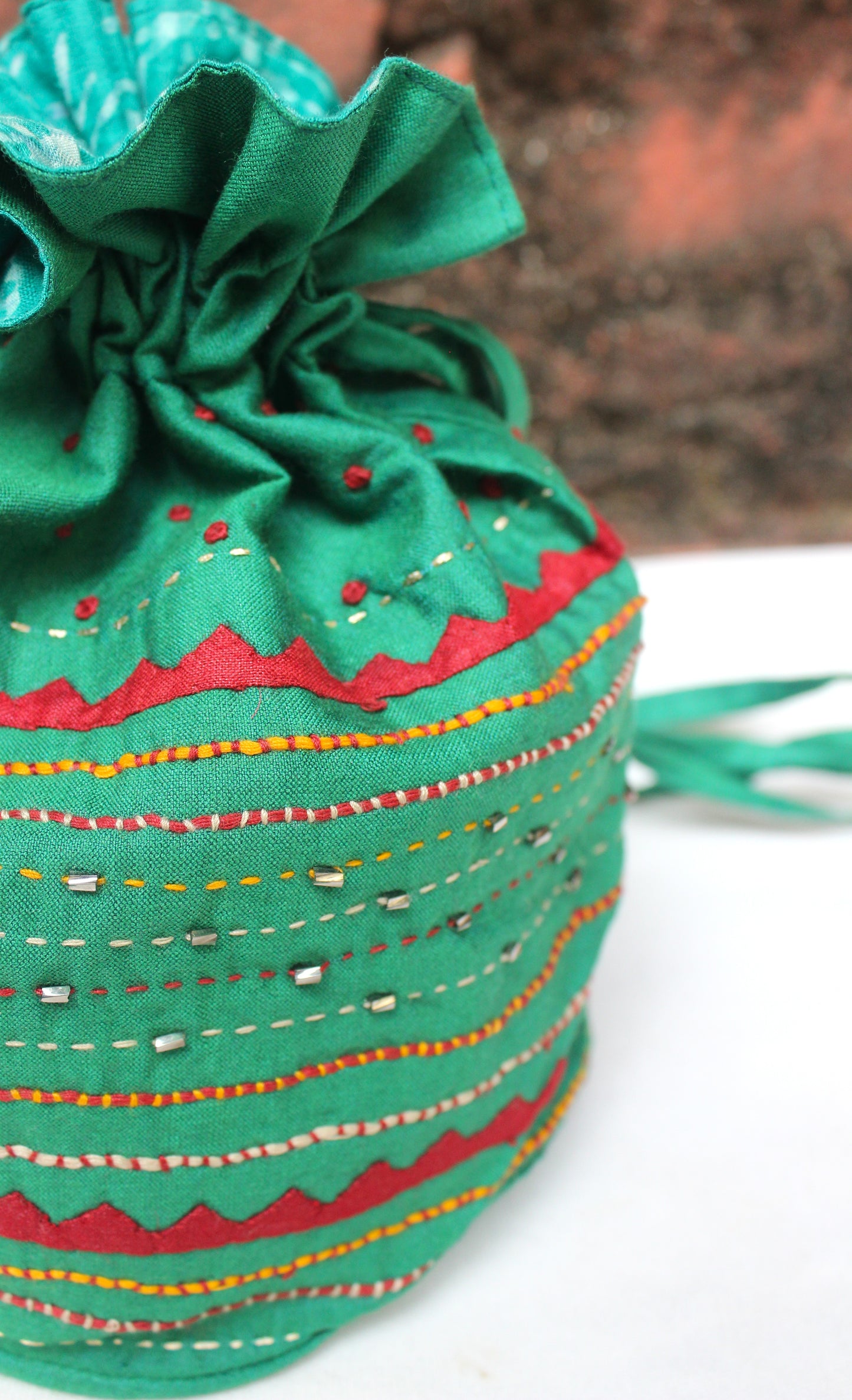 Silk Potli bag with heavy embroidery