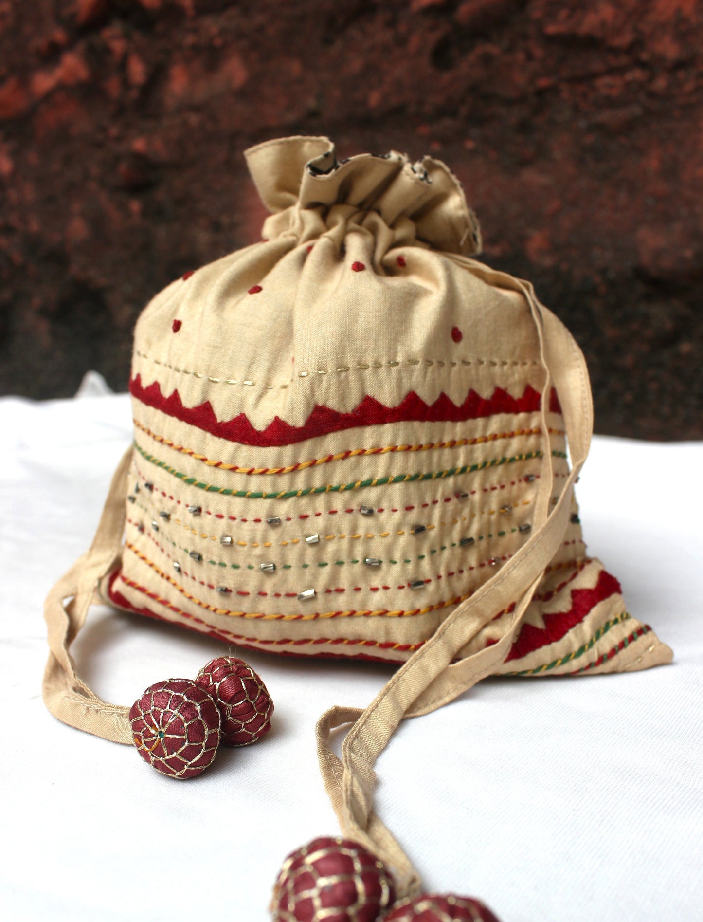 Silk Potli bag with heavy embroidery