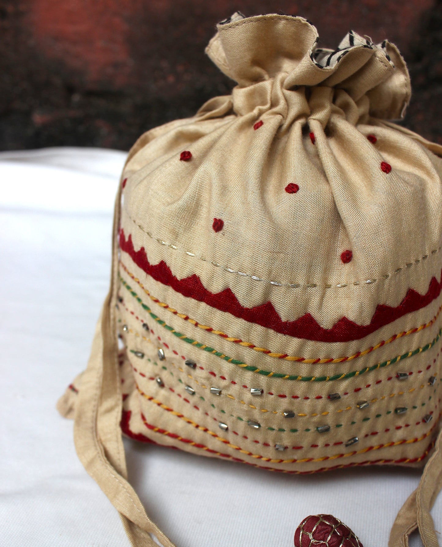 Silk Potli bag with heavy embroidery