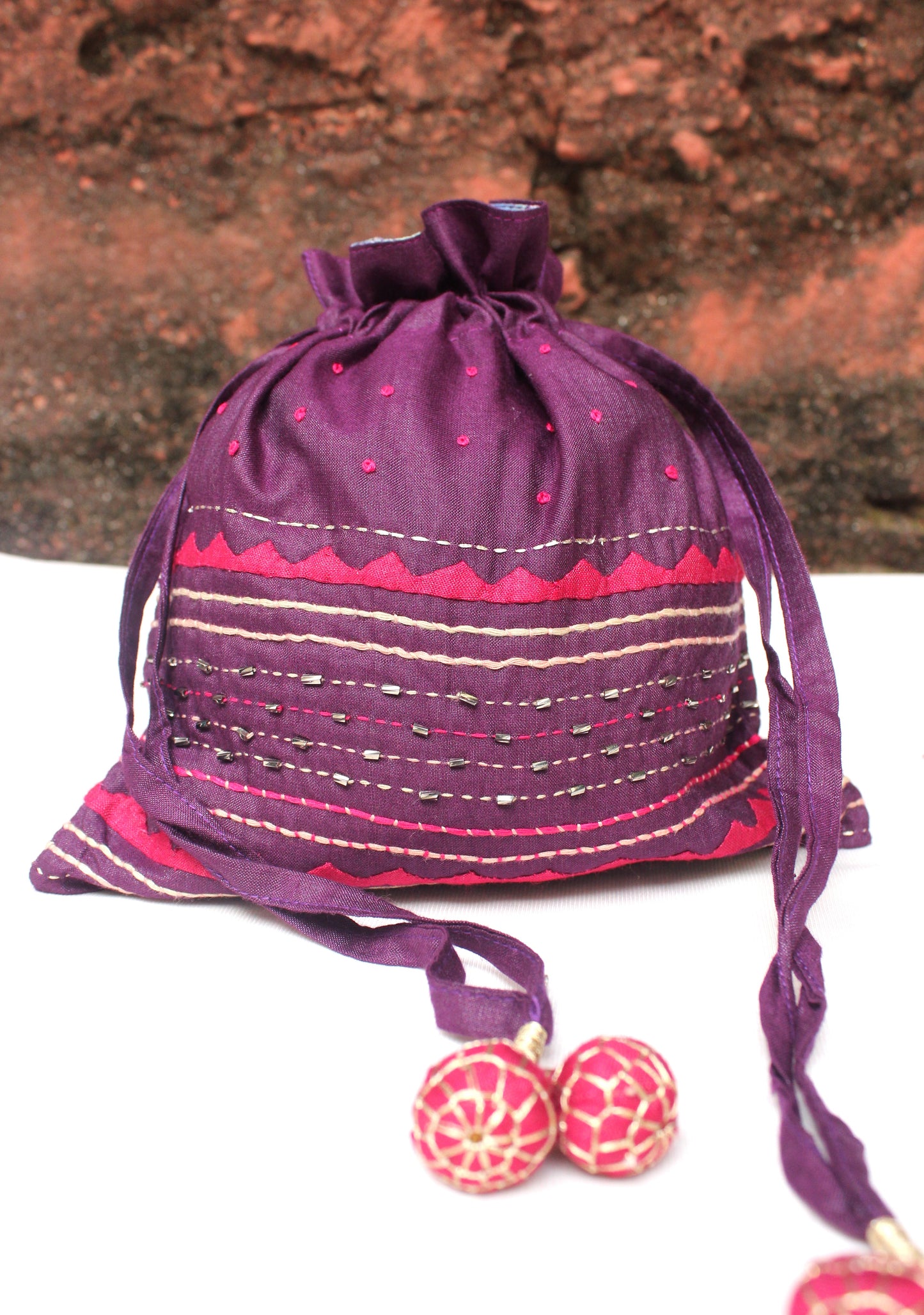 Silk Potli bag with heavy embroidery