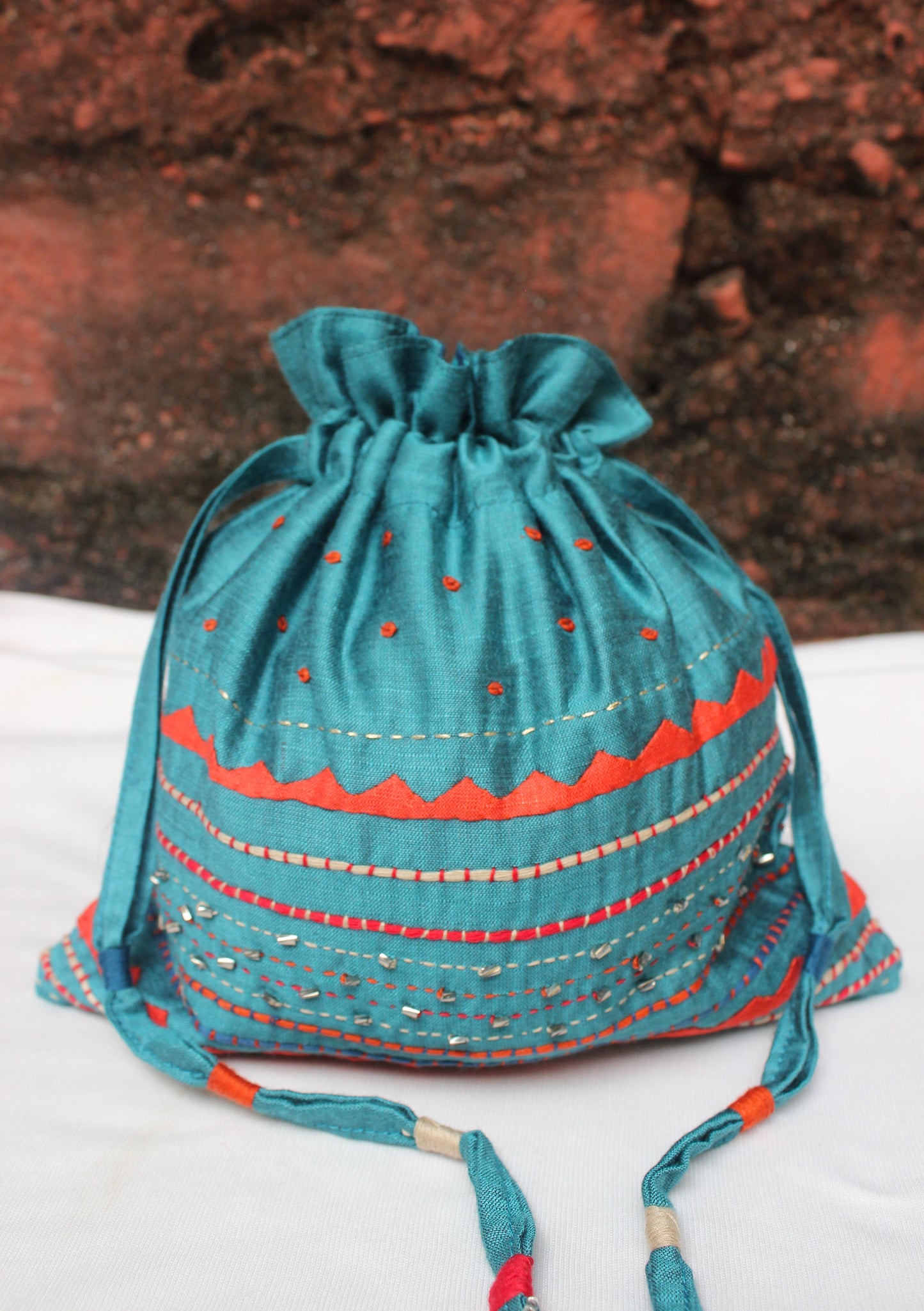 Silk Potli bag with heavy embroidery