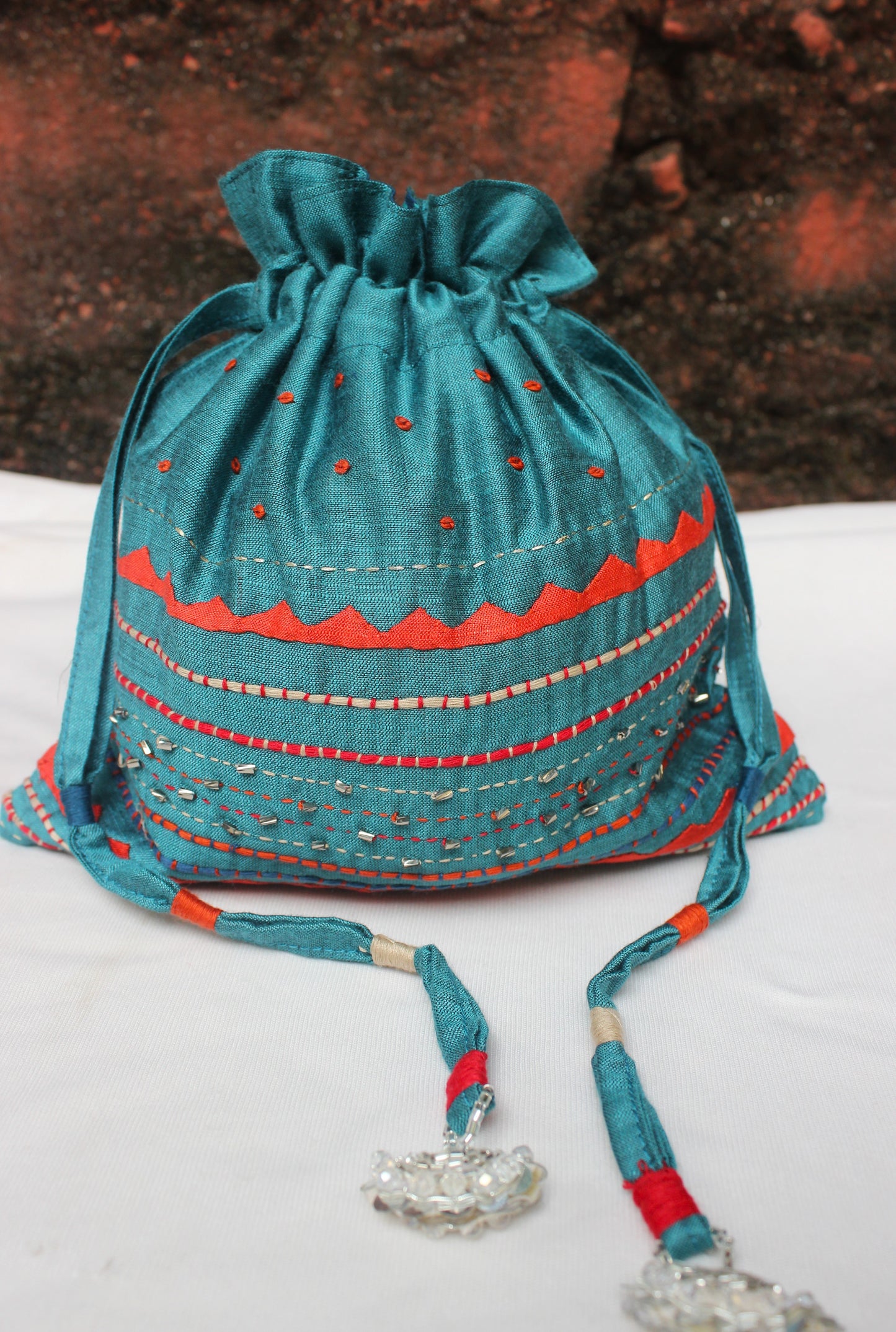 Silk Potli bag with heavy embroidery