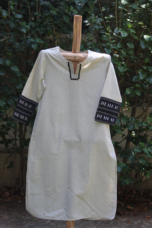 Striped kurta with applique work.