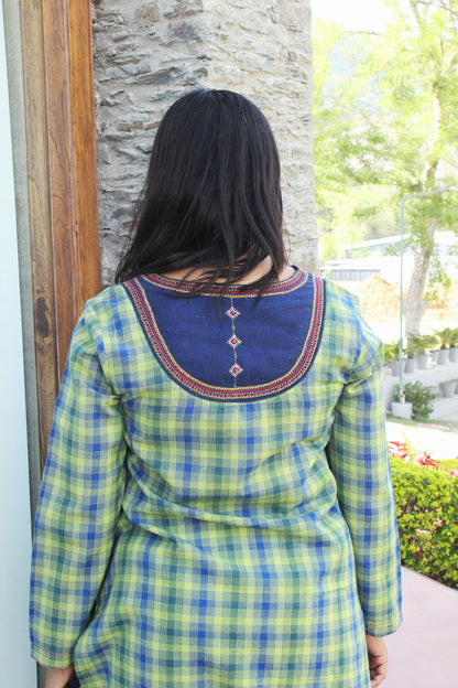Woman wearing Kashmiri-inspired checkered cotton kurta with navy blue embroidered yoke and long sleeves.