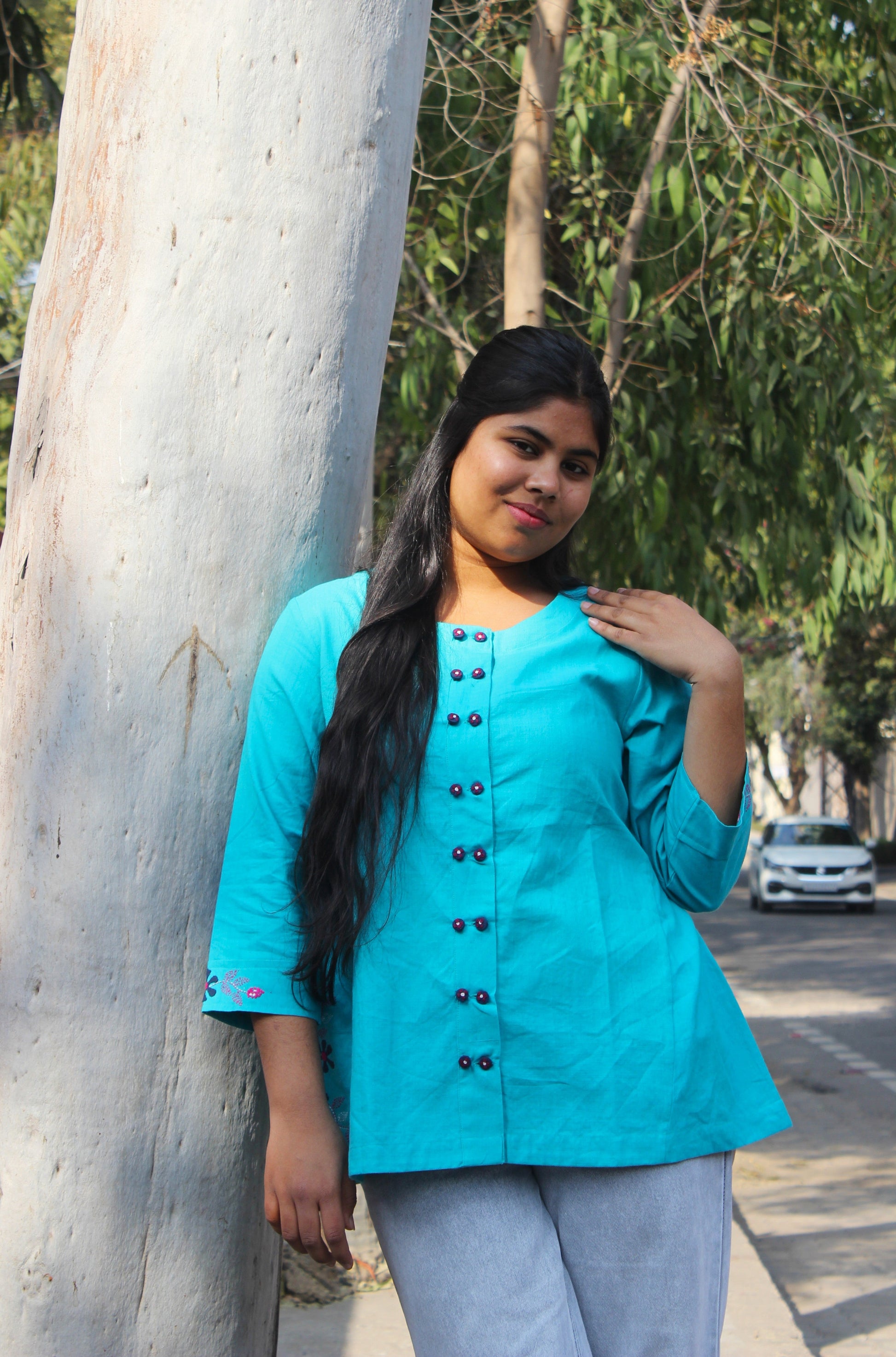 turquoise A-line cotton top with hand embroidery