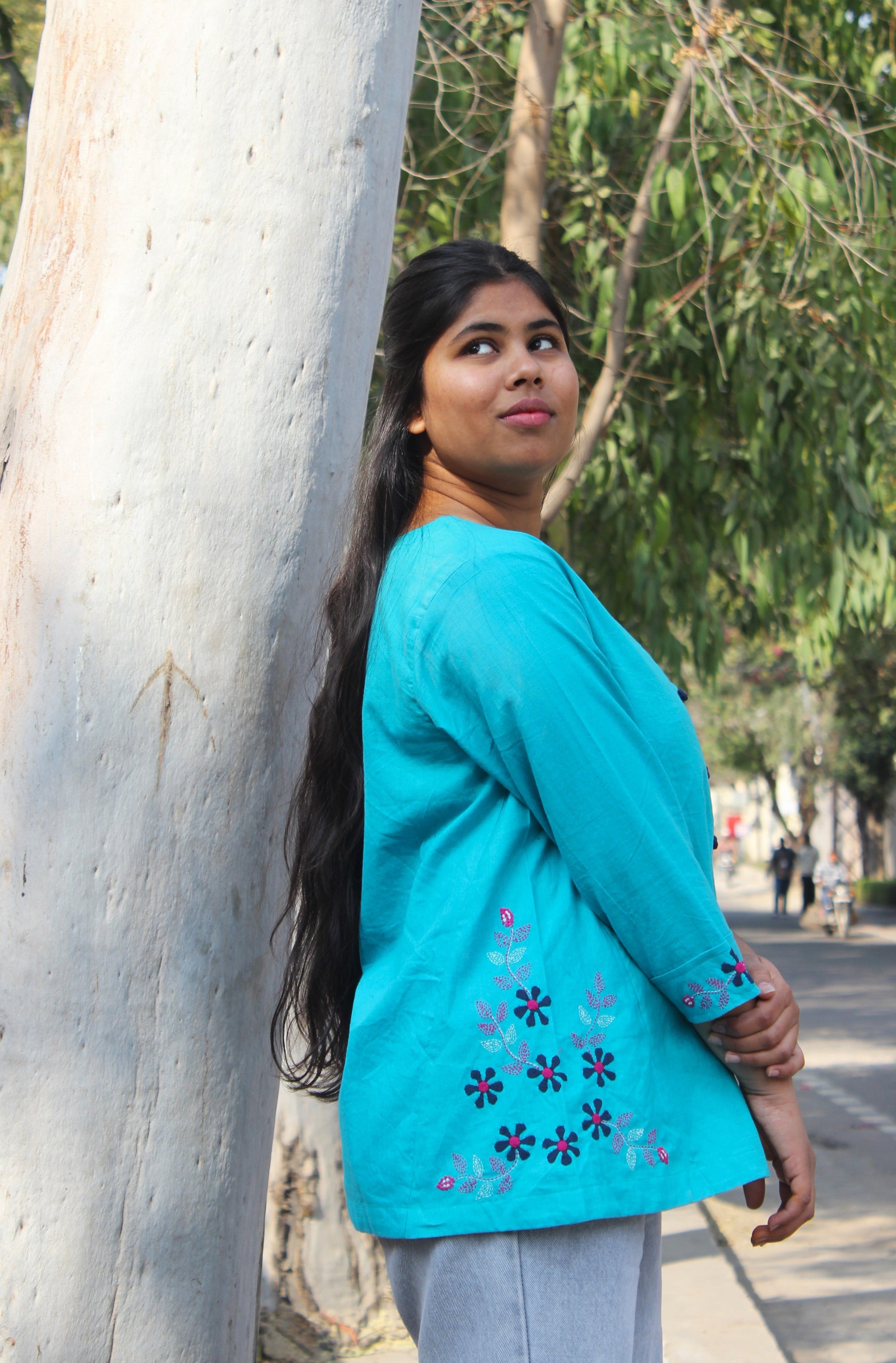 turquoise A-line cotton top with hand embroidery