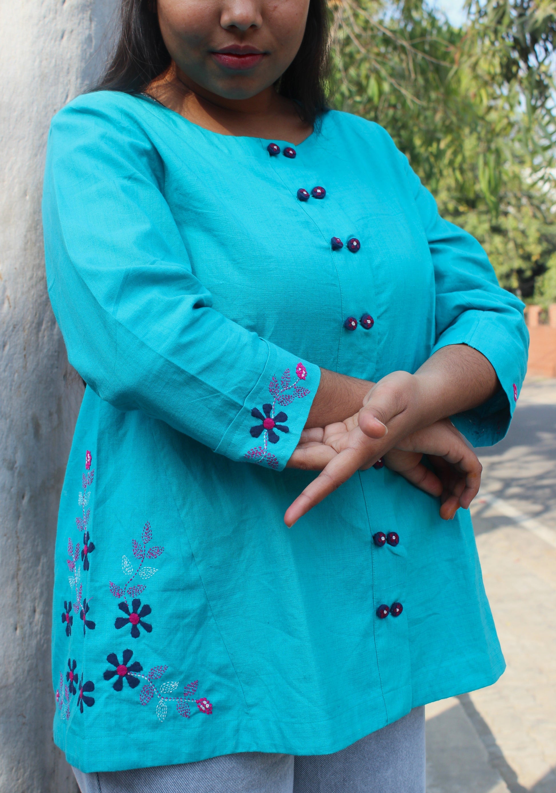 turquoise A-line cotton top with hand embroidery