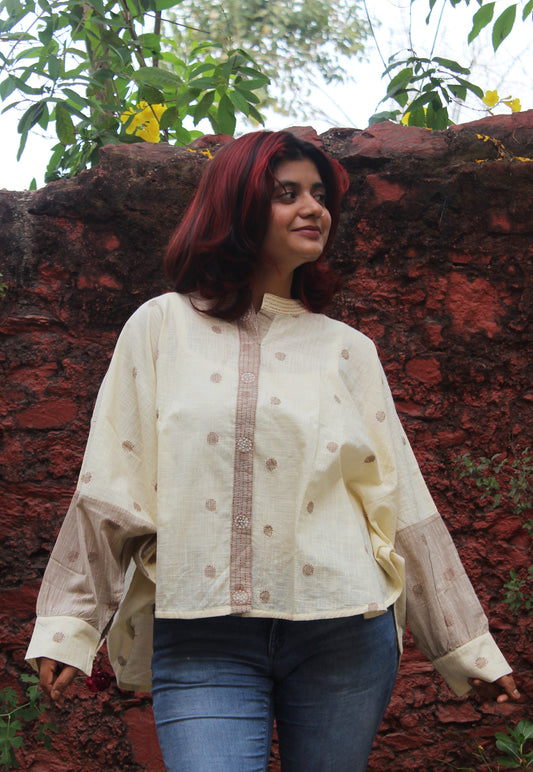 Cotton dolman sleeve top with hand embroidered circular butti motifs