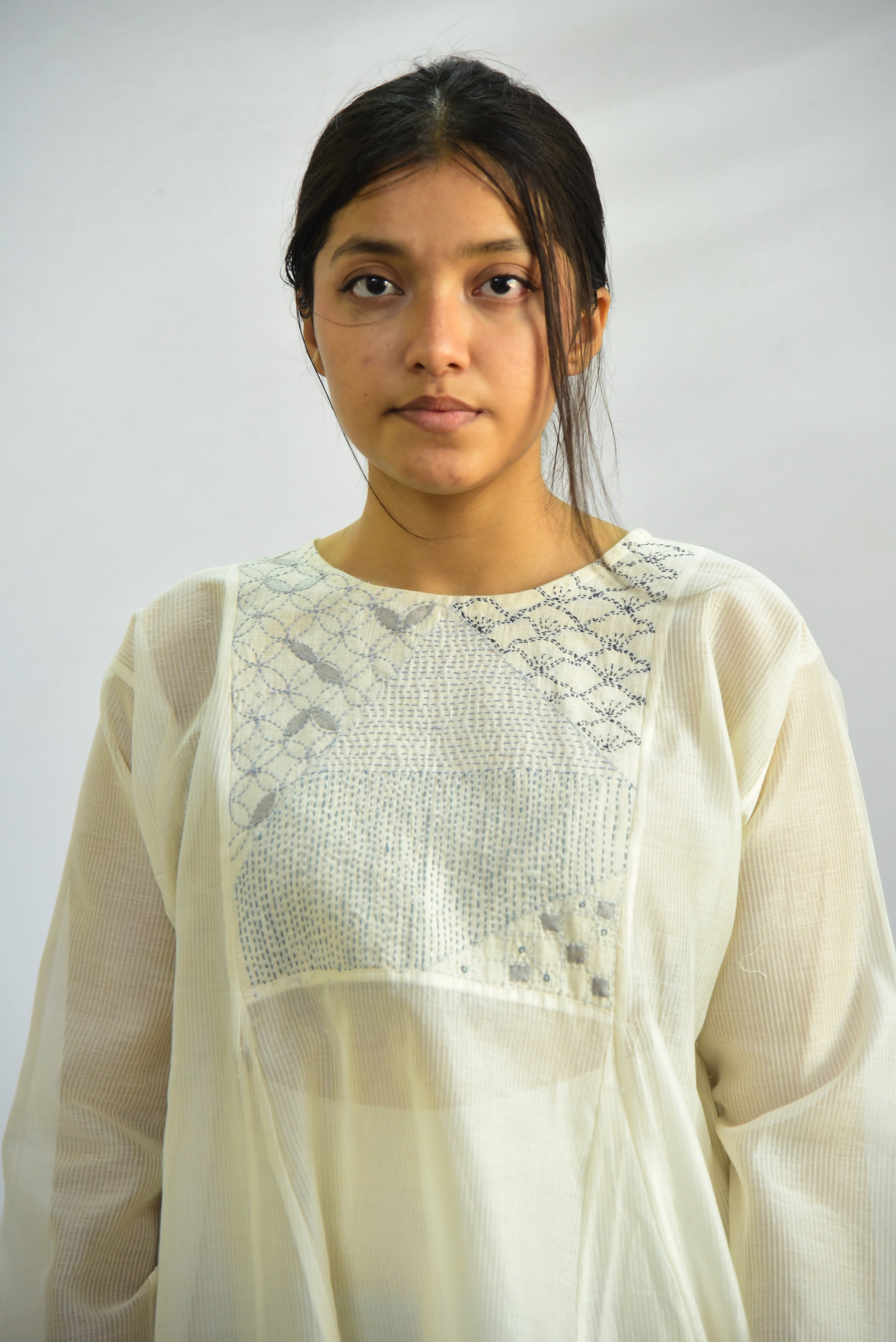 Sadhna 'Dhavlo' White Applique and Tanka Work Short Cotton Kurta